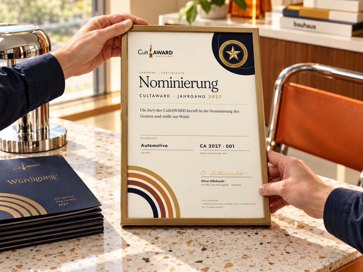 Hands placing the CultAWARD nomination certificate in a brass frame, with tribute booklets on a terrazzo table (AI-generated)